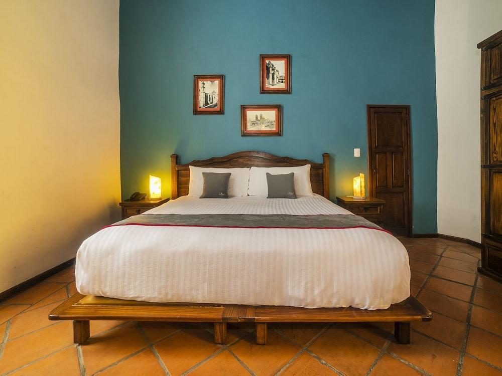 Collection O Al Otro Lado Del Rio, Puebla 호텔 외부 사진 A bedroom at the hotel