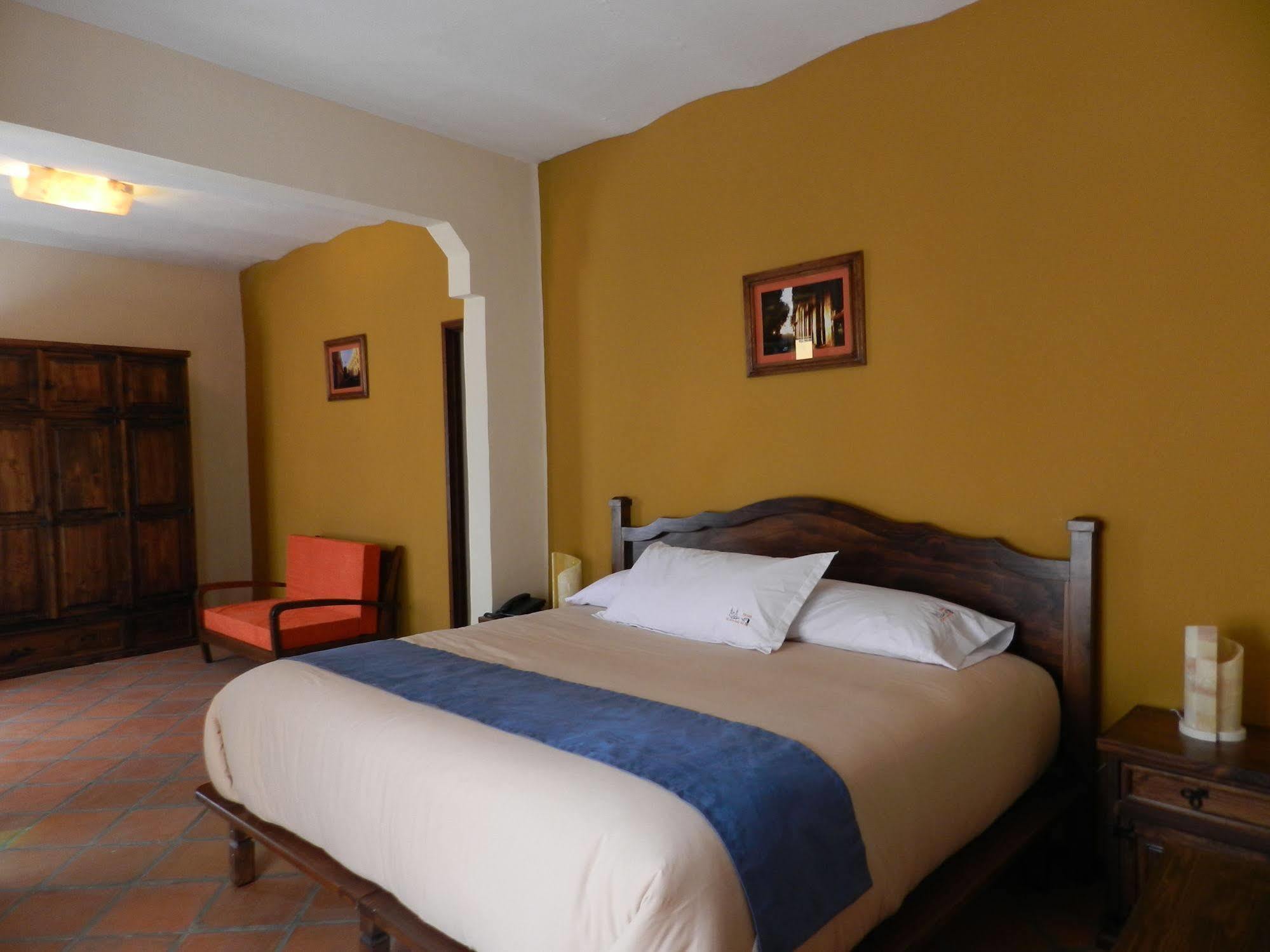 Collection O Al Otro Lado Del Rio, Puebla 호텔 외부 사진 A bedroom at the hotel