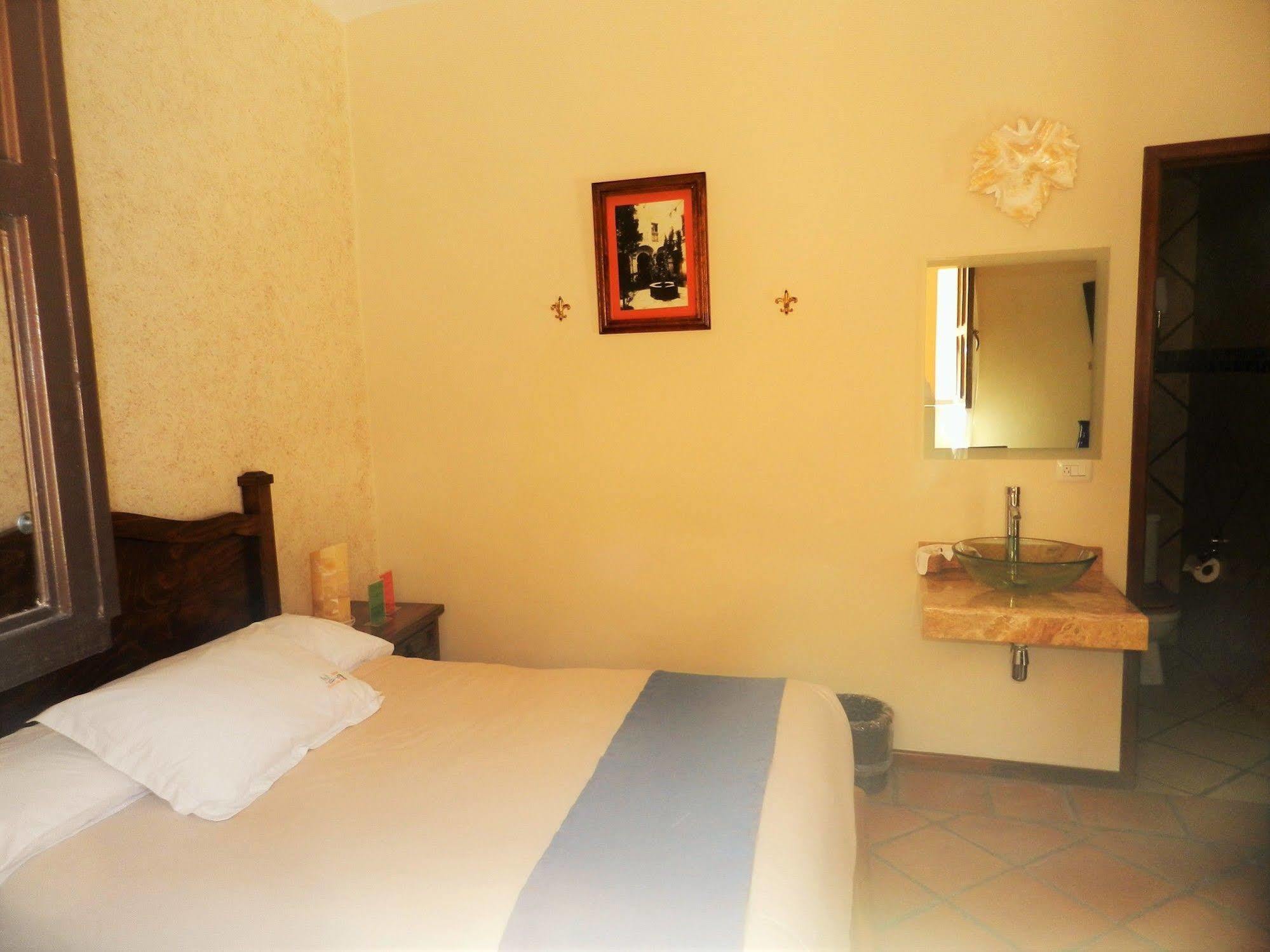 Collection O Al Otro Lado Del Rio, Puebla 호텔 외부 사진 A room at the hotel