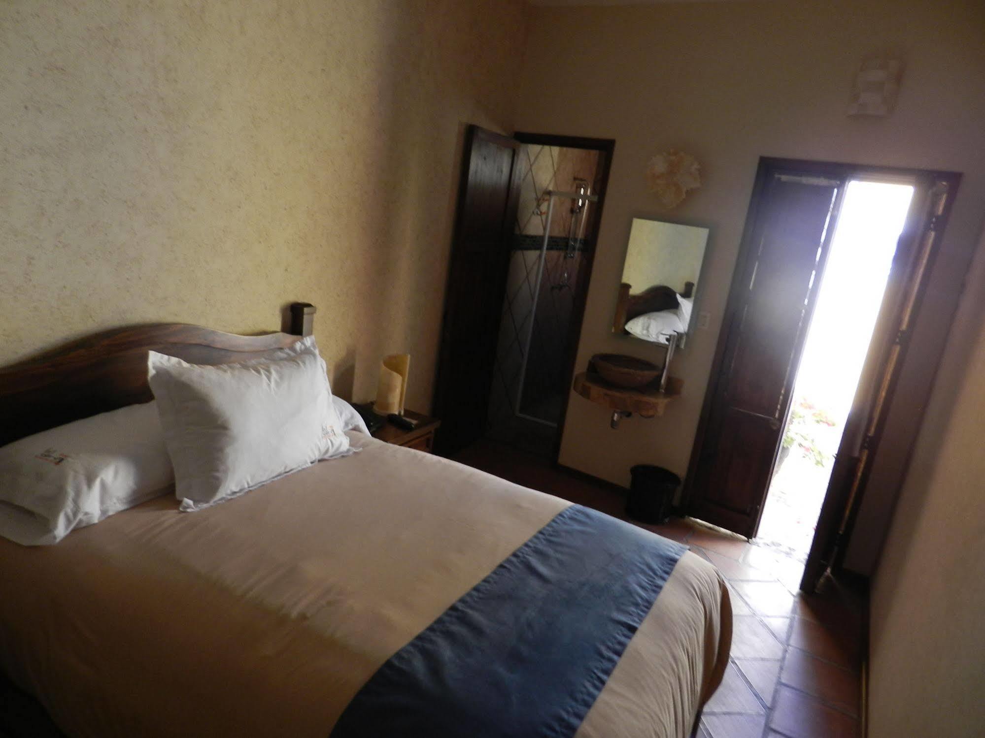 Collection O Al Otro Lado Del Rio, Puebla 호텔 외부 사진 A room at the hotel