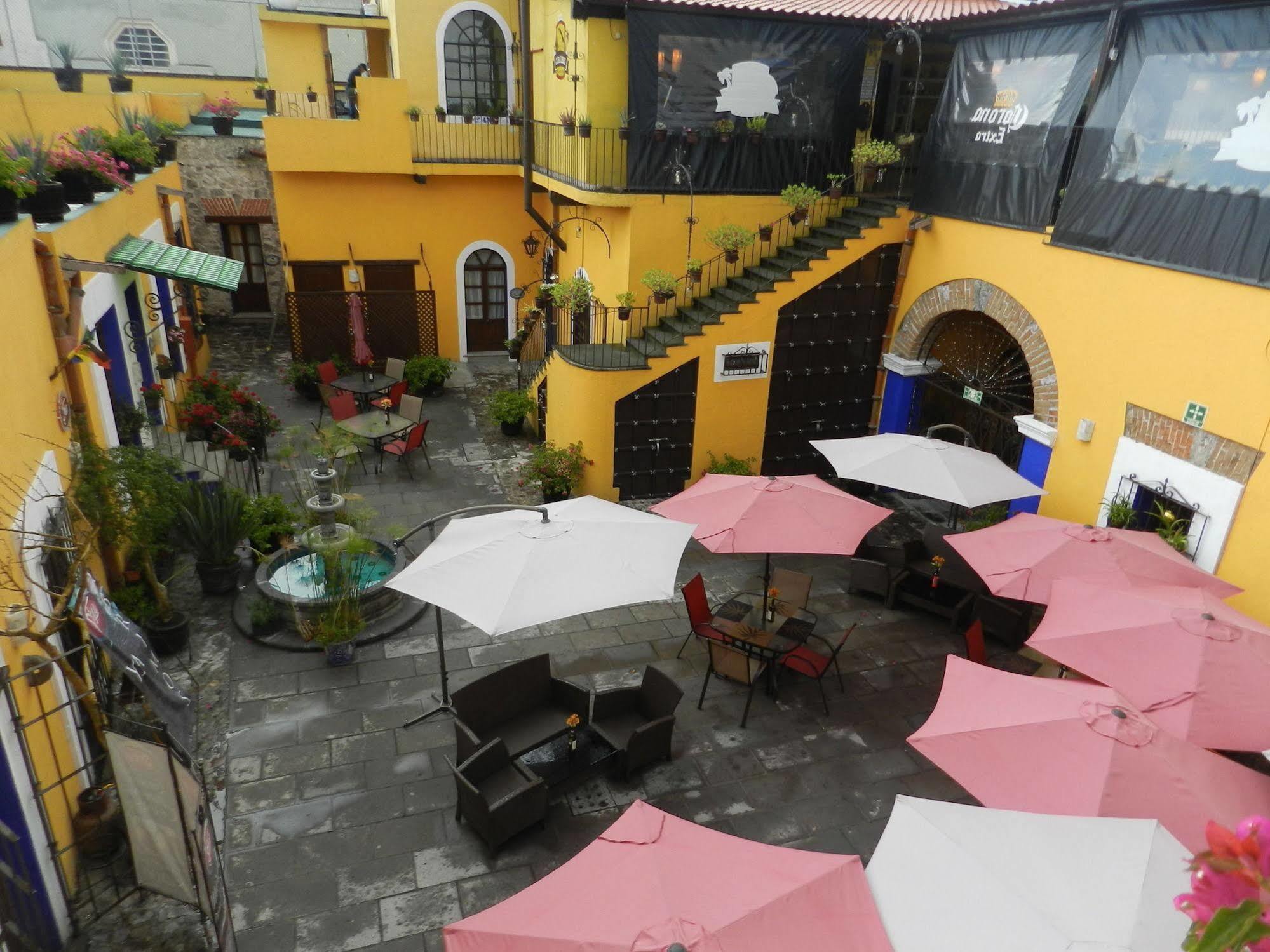 Collection O Al Otro Lado Del Rio, Puebla 호텔 외부 사진 Patio of the restaurant